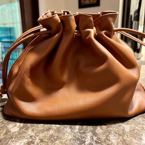 Beautiful Italian leather drawstring bag.